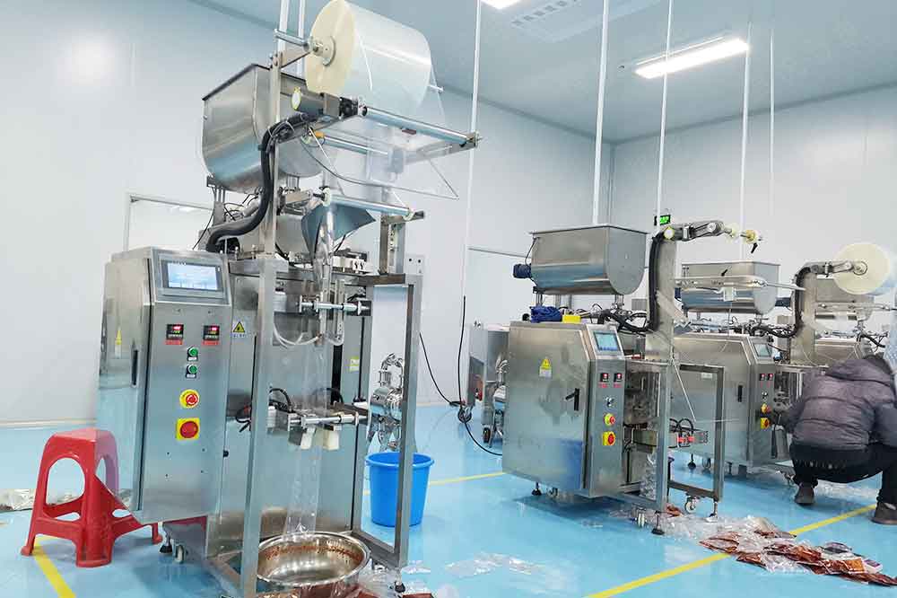 全自動(dòng)火鍋底料包裝機(jī)用于火鍋料、豆瓣醬、辣椒醬等等產(chǎn)品包裝